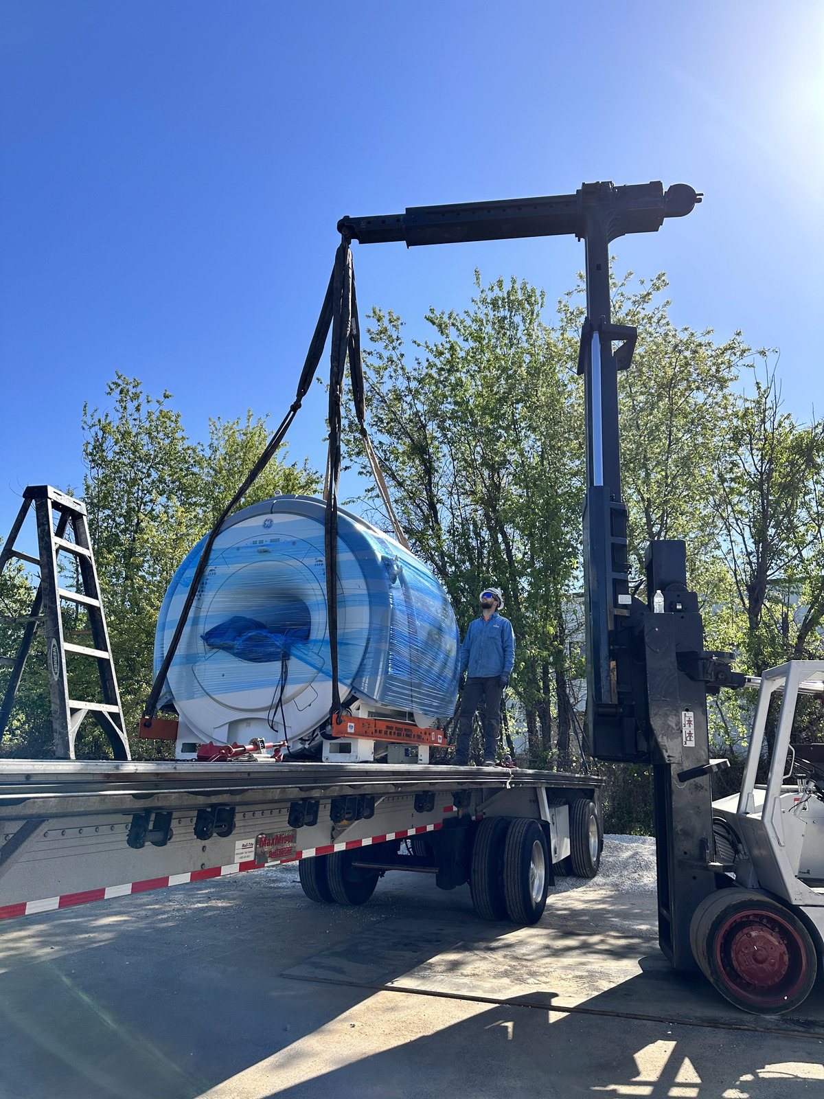 Major medical equipment delivered by crane