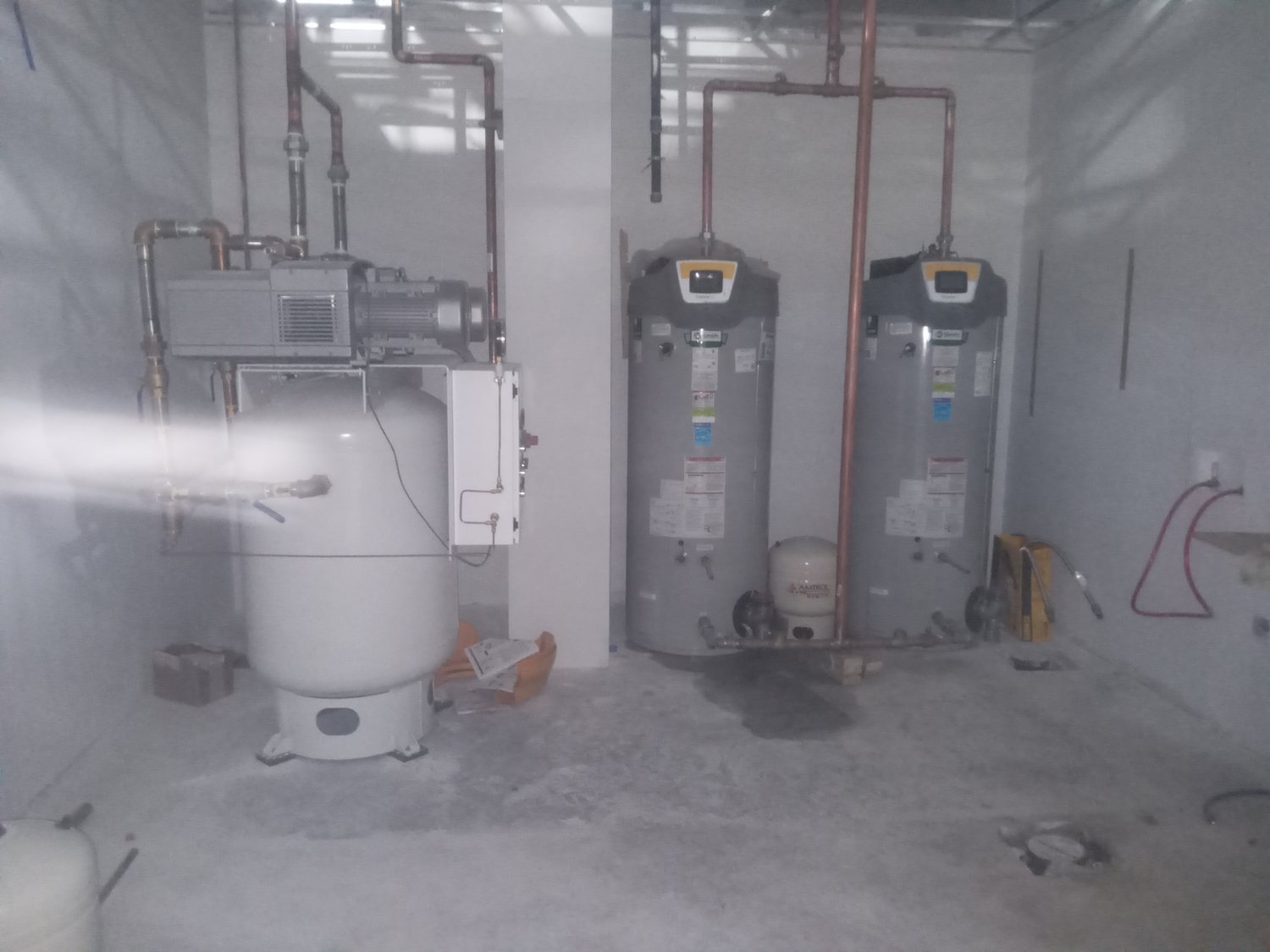 Mechanical room with chiller and system tanks